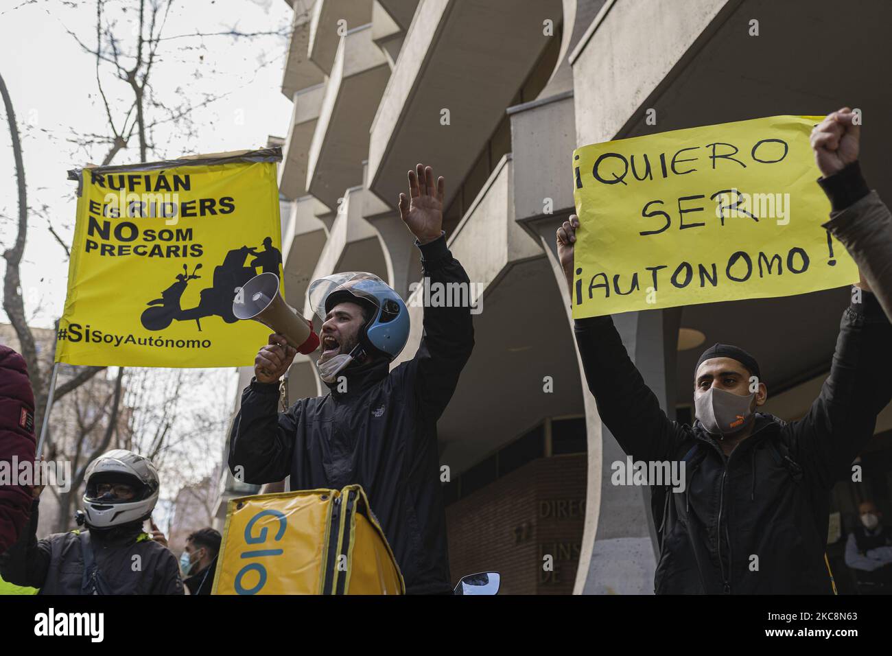 Delivery workers during the demonstration on Thursday, February 4 in Barcelona, Spain, against the proposed law: 'Rider Law'. (Photo by Pau de la Calle/NurPhoto) Stock Photo
