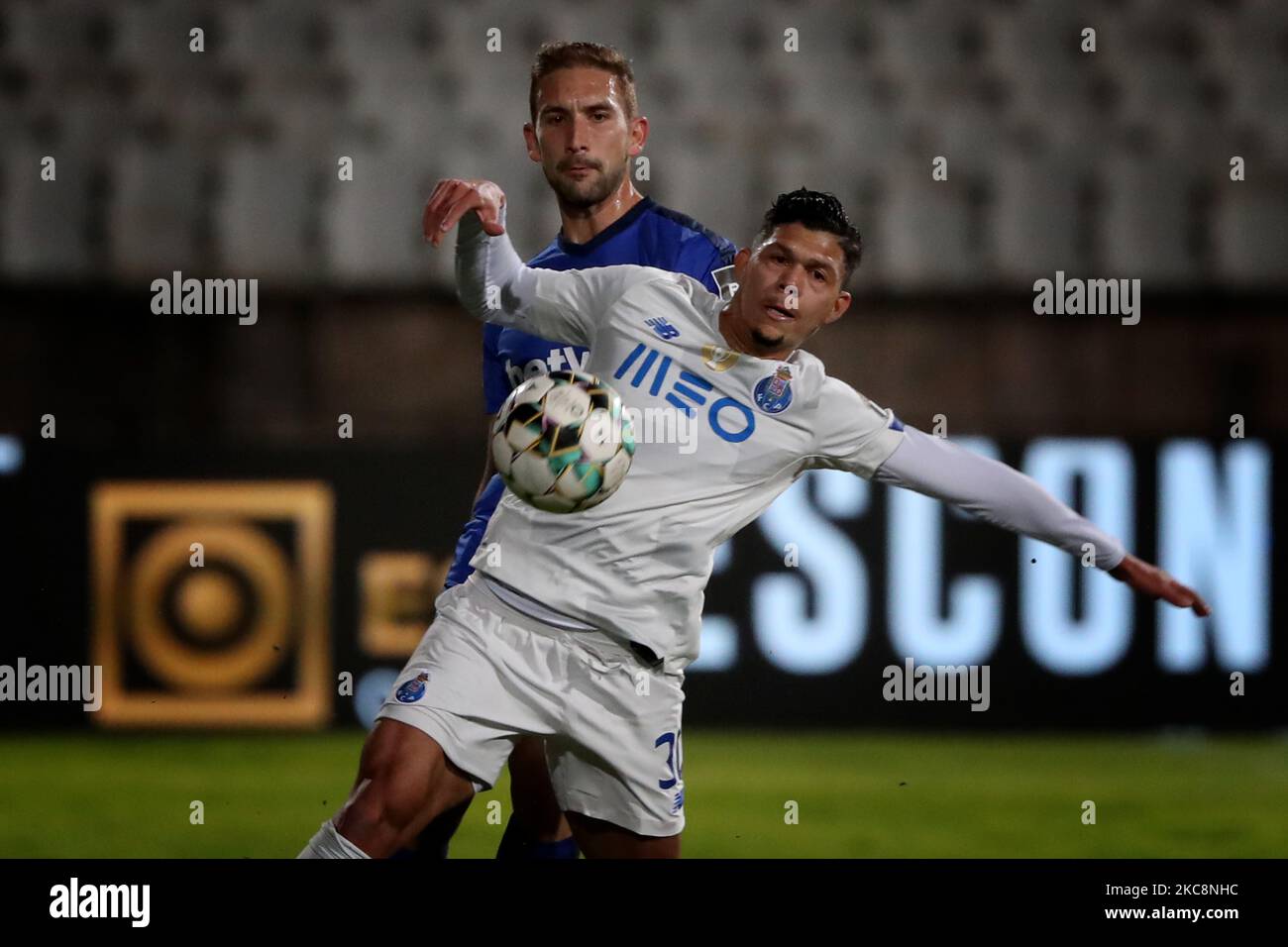 Evanilson of FC Porto (R ) vies with Goncalo Silva of Belenenses SAD during the Portuguese League football match between Belenenses SAD and FC Porto at Jamor stadium in Oeiras, Portugal on February 4, 2021. (Photo by Pedro FiÃºza/NurPhoto) Stock Photo
