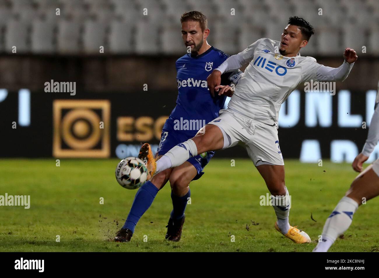 Evanilson of FC Porto (R ) vies with Goncalo Silva of Belenenses SAD during the Portuguese League football match between Belenenses SAD and FC Porto at Jamor stadium in Oeiras, Portugal on February 4, 2021. (Photo by Pedro FiÃºza/NurPhoto) Stock Photo