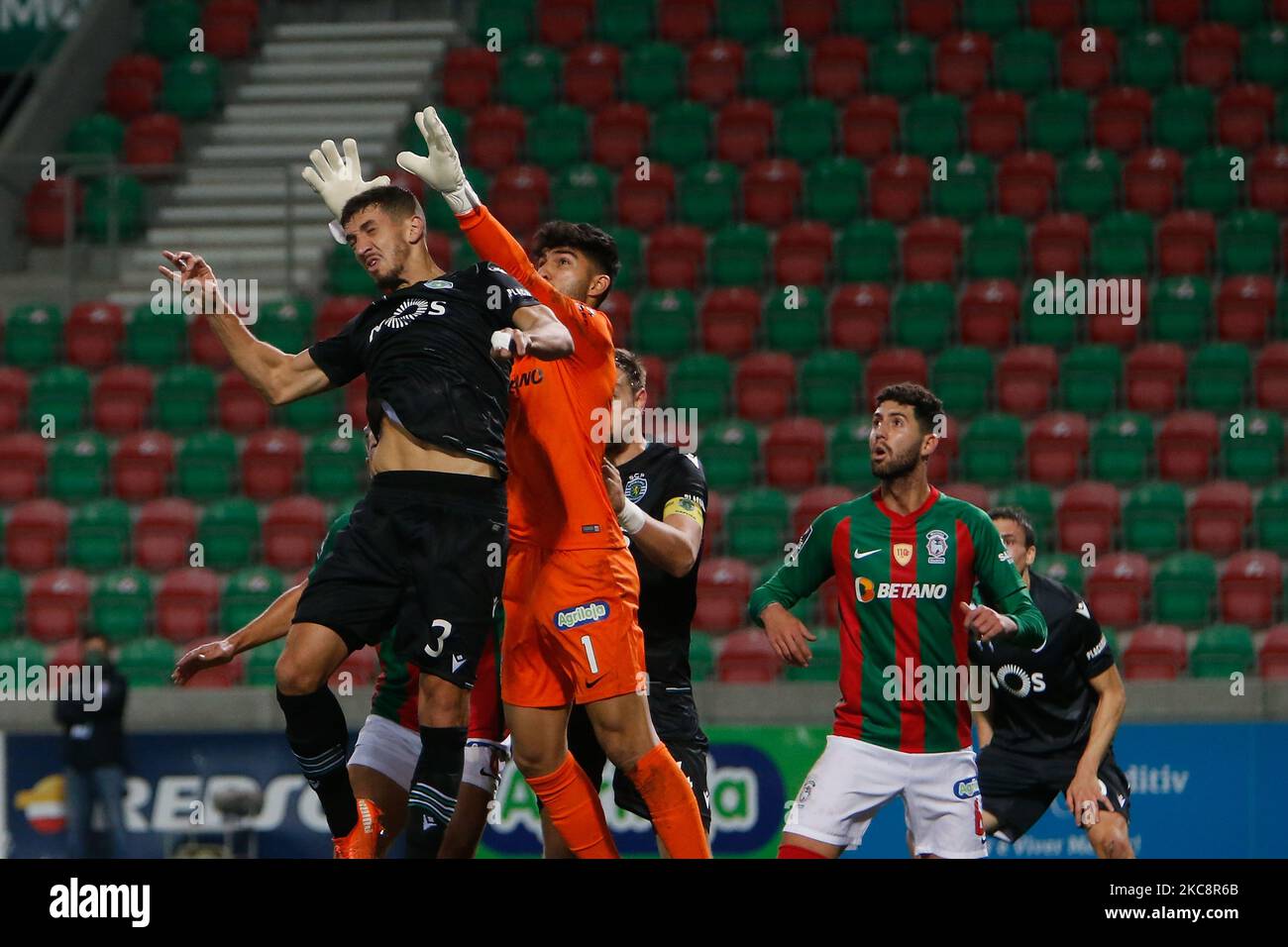 CS Maritimo Goalkeeper Amir Abedzadeh battle for the ball with Zouhair Feddal of Sporting CP during the Liga Nos match between CS Maritimo and Sporting SP at Estádio do Maritimo on February 05, 2021 in Funchal, Madeira, Portugal. (Photo by Valter Gouveia/NurPhoto) Stock Photo