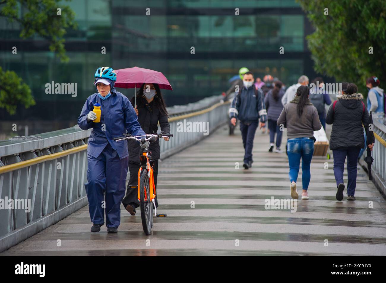 People wearing a protective face masks to prevent the spread of the novel Coronavirus pandemic in Bogota Colombia on February 9, 2021. (Photo by Sebastian Barros/NurPhoto) Stock Photo