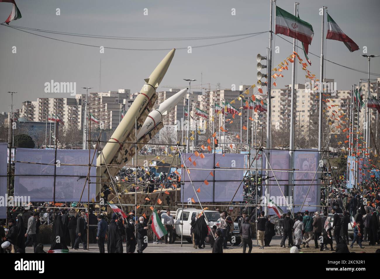 Iran-made, Dezful medium range ballistic missile (Bottom) and Zolfaghar road-mobile single-stage solid-propelled liquid fueled missile are pictured in the Azadi (Freedom) square during a rally to commemorate the 42nd Victory anniversary of the Islamic Revolution, that held with motorcycles amid the new coronavirus disease (COVID-19) outbreak in Iran, in Tehran on February 10, 2021, on February 10, 2021. (Photo by Morteza Nikoubazl/NurPhoto) Stock Photo