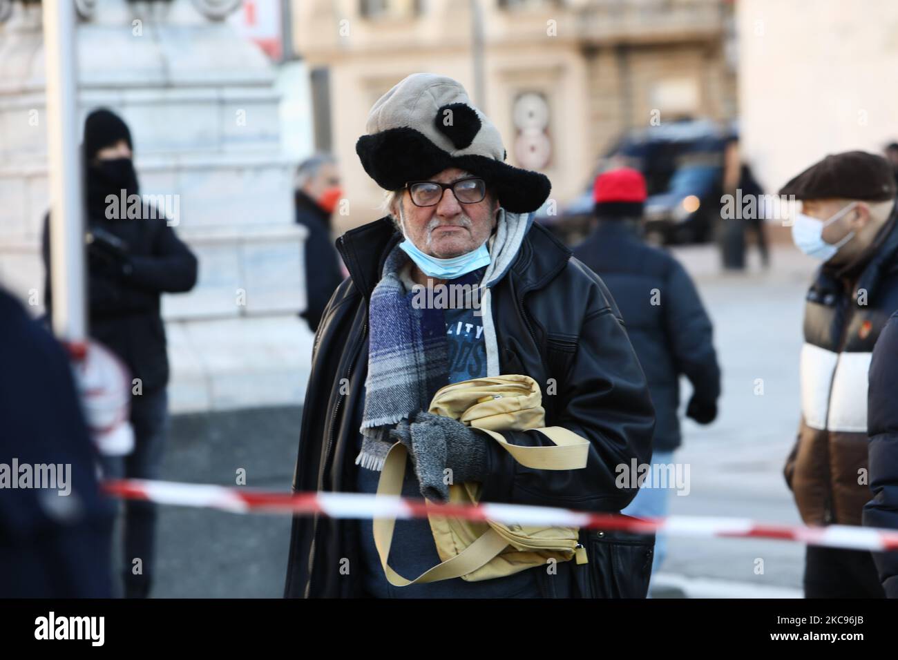 Protest rally of the gilet arancioni deniers against the Italian restrictions for the Coronavirus emergency captained by the leader Antonio Pappalardo in Piazza Duomo, Milano, Italy, on February 13 2021 (Photo by Mairo Cinquetti/NurPhoto) Stock Photo
