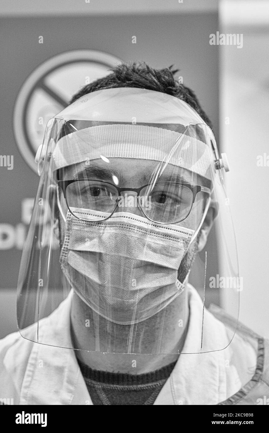 (EDITOR'S NOTE: Image was converted to black and white) In the picture Morandin Riccardo a young volunteer doctor. The municipality of Padua has set up a point for vaccination against Covid19 (Coronavirus) with the vaccine produced by Pfizer-BioNTech inside the pavilions of the exhibition complex in Via Tommaseo. The vaccination campaign for the elderly Over 80 starts today. On February 15, 2021, in Padua, Italy (Photo by Roberto Silvino/NurPhoto) Stock Photo