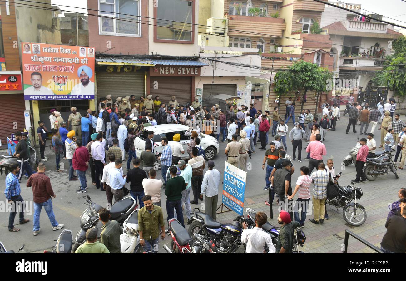 AMRITSAR, INDIA NOVEMBER 4 Police and people gather near the vehicle