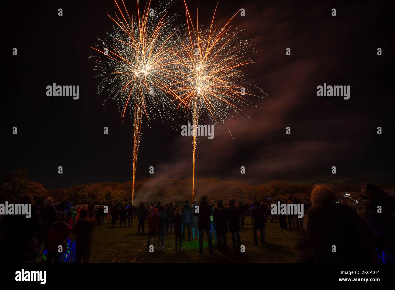 Pembury, Tunbridge Wells, UK. 04 November 2022. A village firework display on the recreation ground, free for residents, and hosted by Pembury Parish Council. The crowds gather for this free event to mark the start of bonfire season and Guy Fawkes Night. ©Sarah Mott / Alamy Live News. Stock Photo