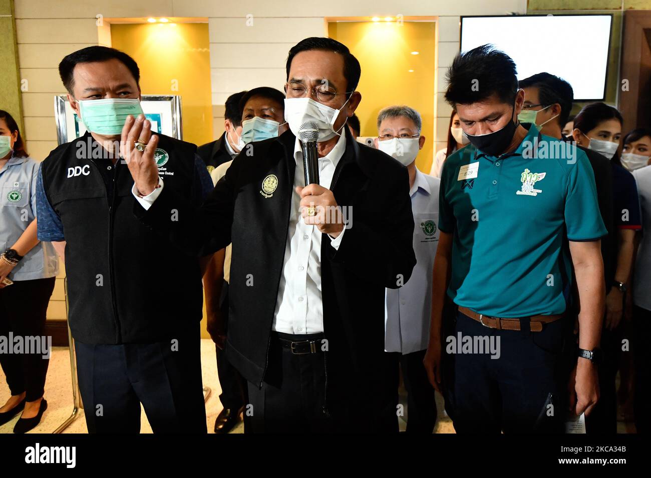 Prime Minister Prayut Chan-O-Cha (center) and Public Health Minister Anutin Charnvirakul (L) speak to the media at Bamrasnaradura Infectious Diseases Institute on February 28, 2021 in Bangkok, Thailand. As the first batch of Sinovac Covid-19 vaccines to against the Covid-19 are administered to health workers between the ages of 18-59. (Photo by Vachira Vachira/NurPhoto) Stock Photo