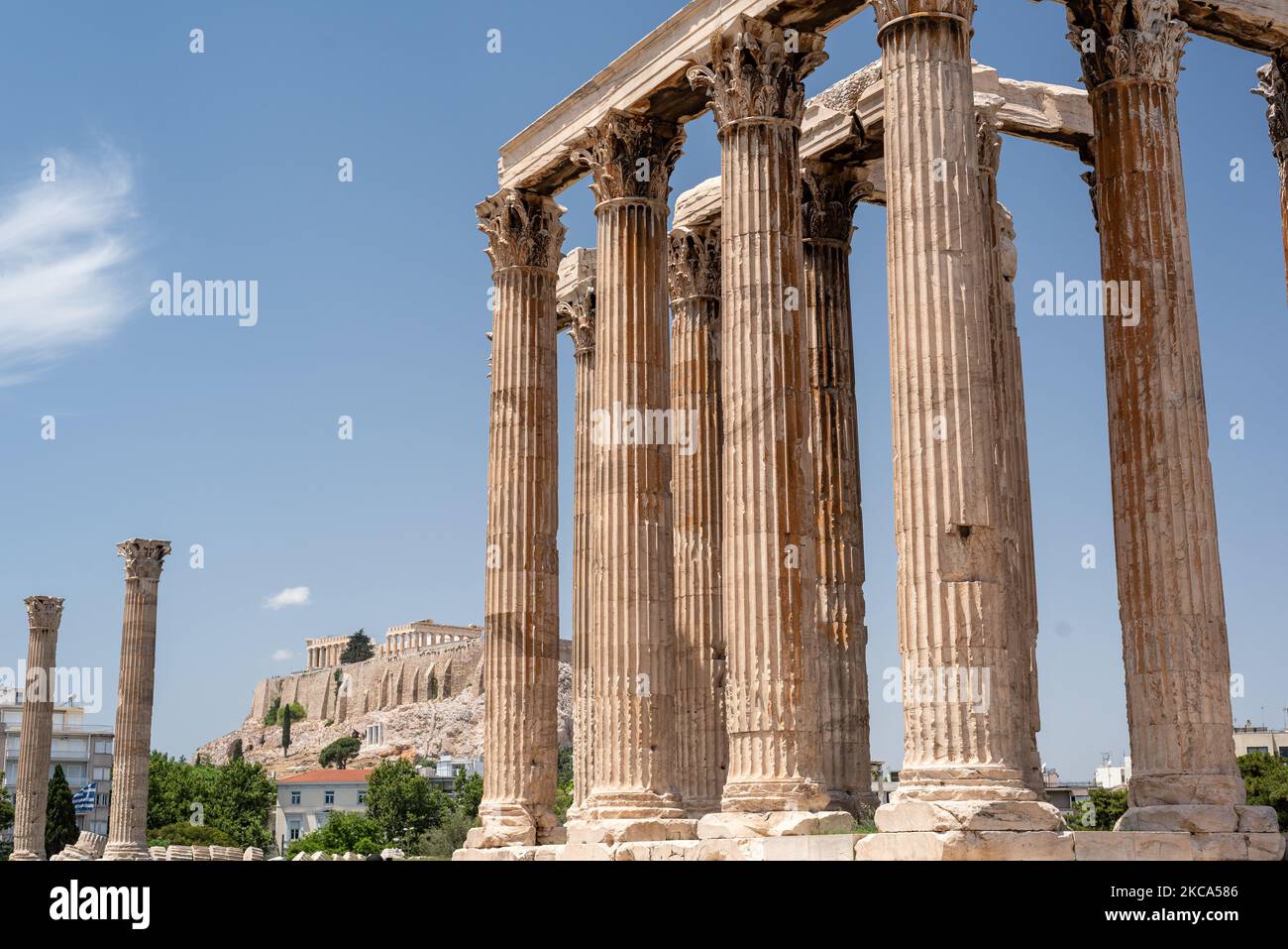 Greece - Temple of Zeus in Athens with the Acropolis in the distance. Stock Photo