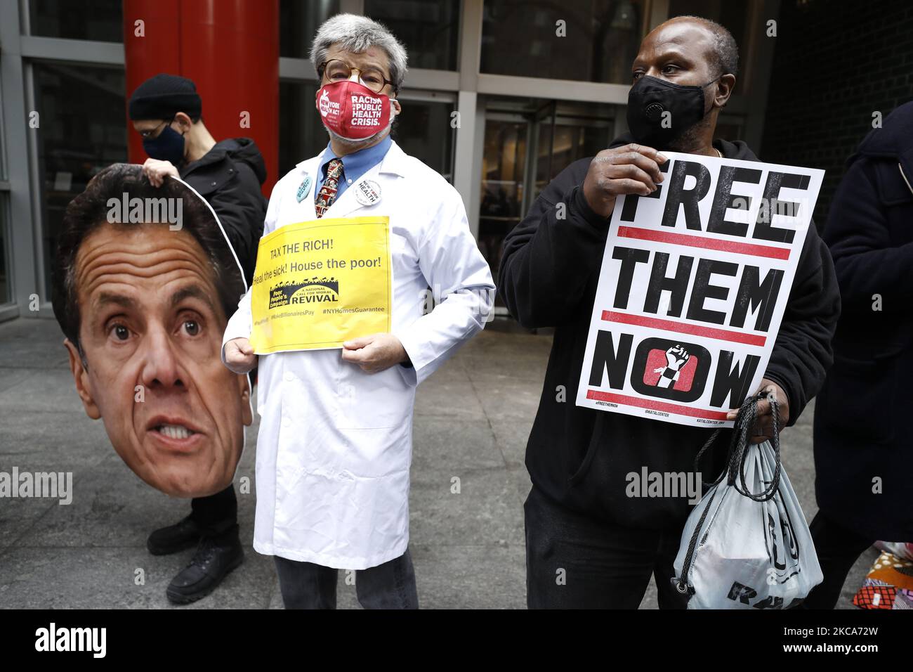 Demonstrators gather in front of New York Governor Andrew Cuomo's office protesting the cuts to Medicaid and other healthcare reductions, including the lack of access to testing for the poor and prison inmates on March 1, 2021 in New York USA. (Photo by John Lamparski/NurPhoto) Stock Photo