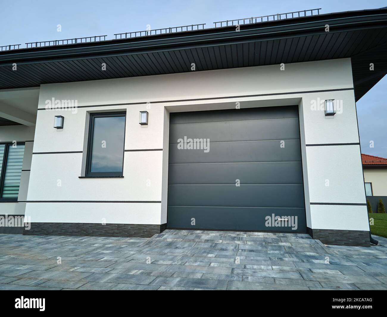 Automatic electric rollup commercial garage gate or pushup door in