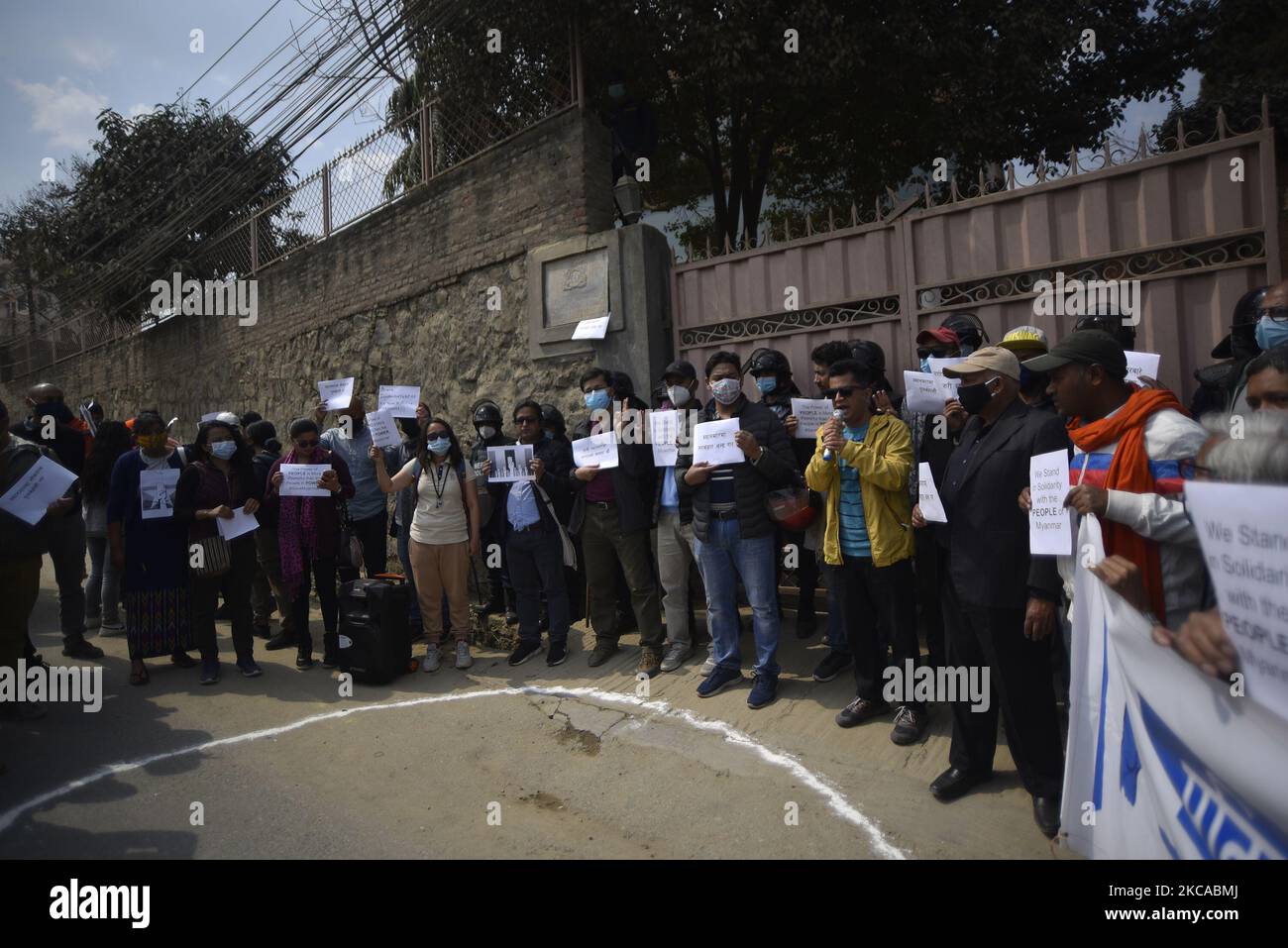 Nepalese Citizen Society activists holds placards during protest against the military coup in-front of Myanmar Embassy at Lalitpur, Nepal on Friday, March 5, 2021. (Photo by Narayan Maharjan/NurPhoto) Stock Photo