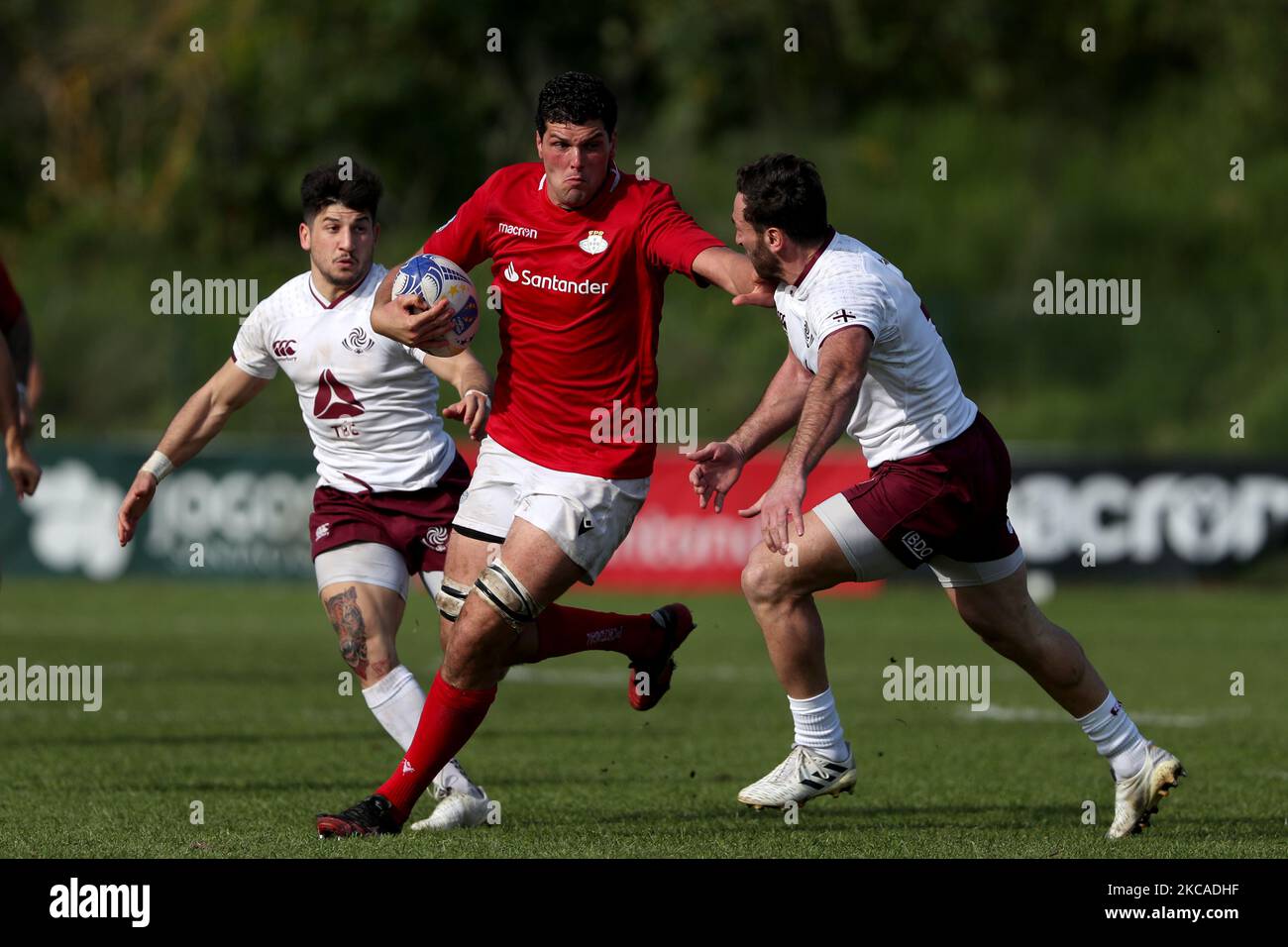 Jose Rebelo de Andrade of Portugal (C ) vies with Aleksandre Todua of Georgia (R ) during the Rugby Europe Championship match between Portugal and Georgia at the Jamor field in Lisbon, Portugal on March 6, 2021. (Photo by Pedro FiÃºza/NurPhoto) Stock Photo