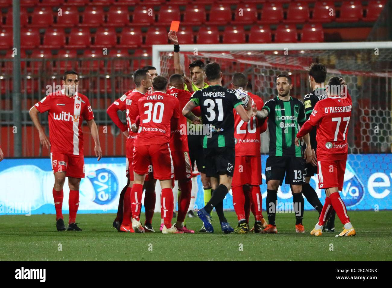 Carlos Augusto of AC Monza take a red card during the Serie B match between AC Monza and Pordenone Calcio at Stadio Brianteo on March 06, 2021 in Monza, Italy. (Photo by Mairo Cinquetti/NurPhoto) Stock Photo