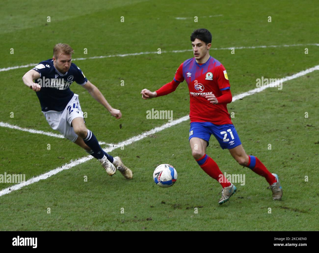 John Buckley #21 of Blackburn Rovers Under pressure fromAndy Rinomhota #35  of Cardiff City during the Sky Bet Championship match Cardiff City vs  Blackburn Rovers at Cardiff City Stadium, Cardiff, United Kingdom