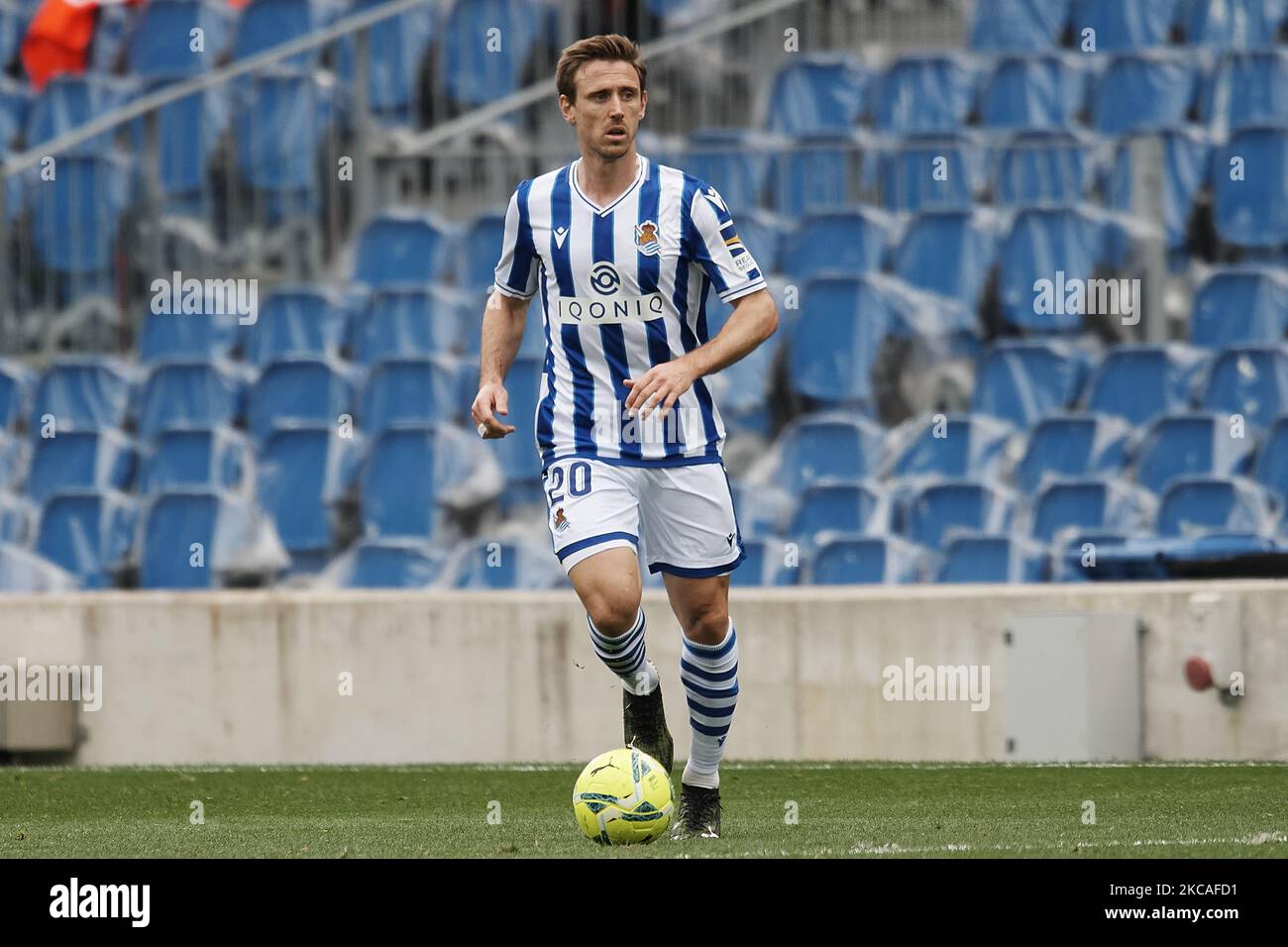 Nacho Monreal of Real Sociedad runs with the ball during the La Liga Santander match between Real Sociedad and Deportivo Alaves at Estadio Anoeta on February 21, 2021 in San Sebastian, Spain. Sporting stadiums around Spain remain under strict restrictions due to the Coronavirus Pandemic as Government social distancing laws prohibit fans inside venues resulting in games being played behind closed doors. (Photo by Jose Breton/Pics Action/NurPhoto) Stock Photo