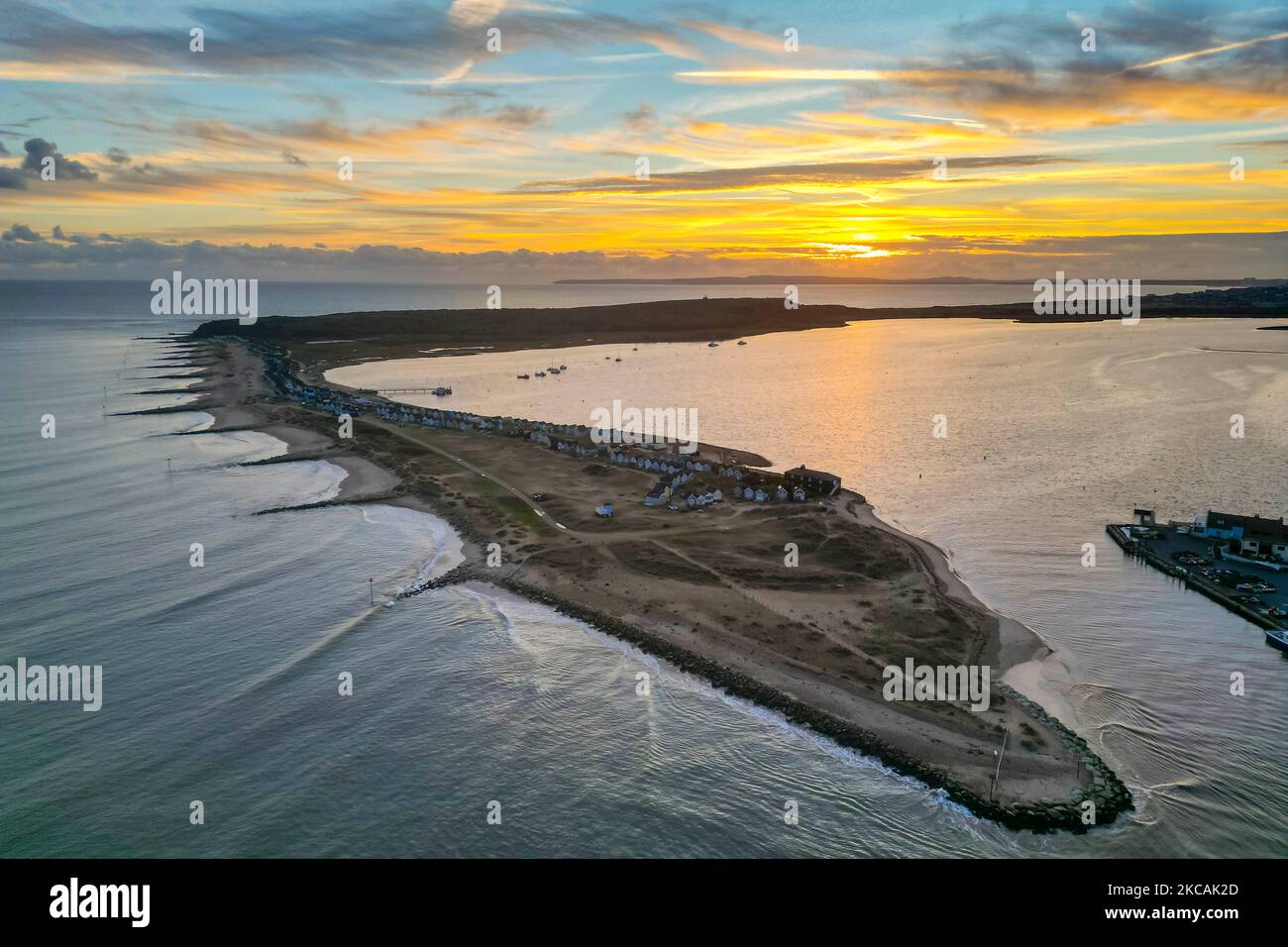 View from the air of the autumn sunset at Mudeford Spit at Mudeford in Dorset, UK. Stock Photo