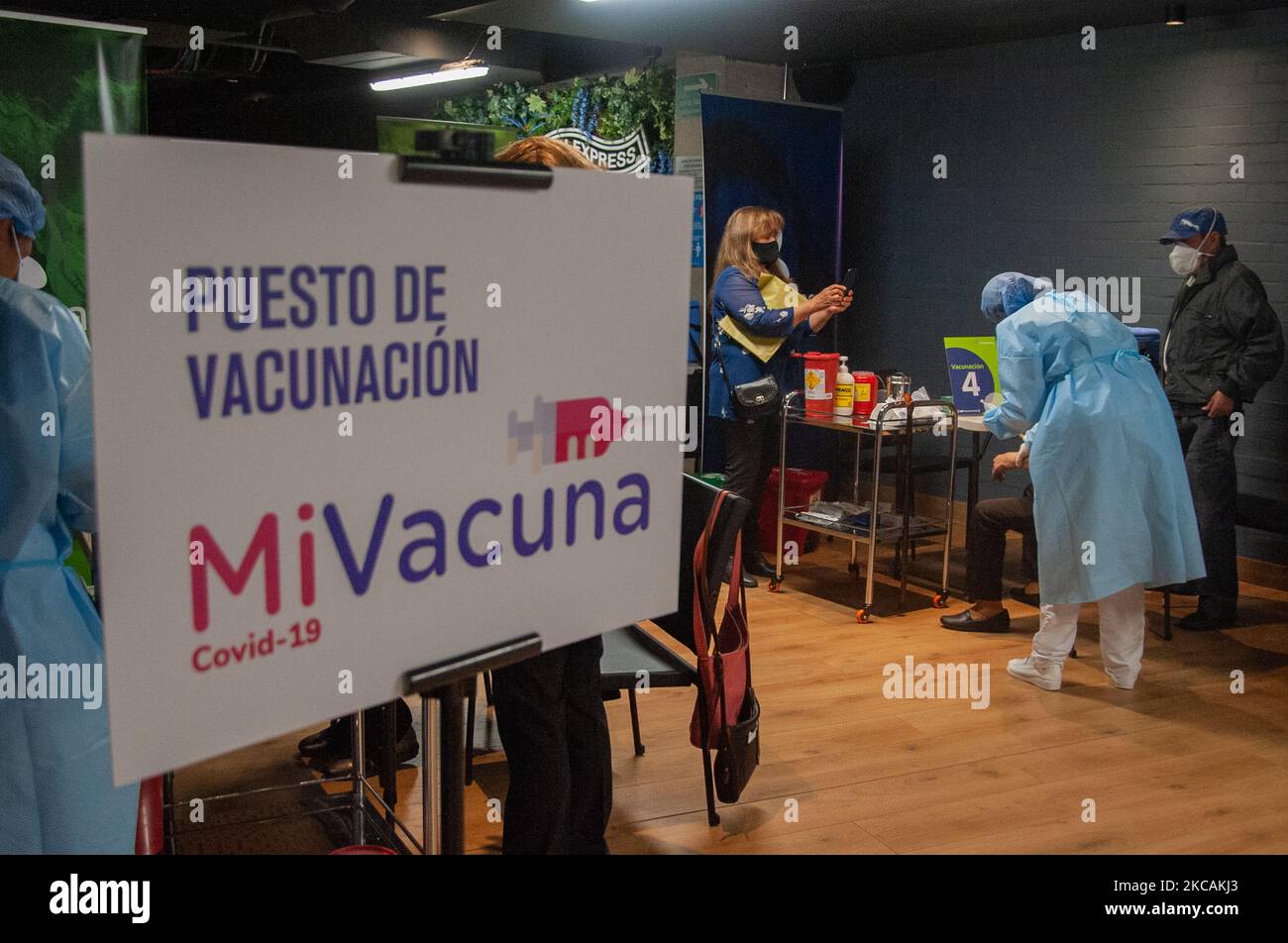 A government campaing sing of the 'Mi Vacuna' app for citizens is seen during vaccination of elders in Bogota, Colombia on March 9, 2021 after Colombia started vaccination of elders over the age of 80 against the Novel Coronavirus, COVID-19, pandemic. (Photo by Sebastian Barros/NurPhoto) Stock Photo