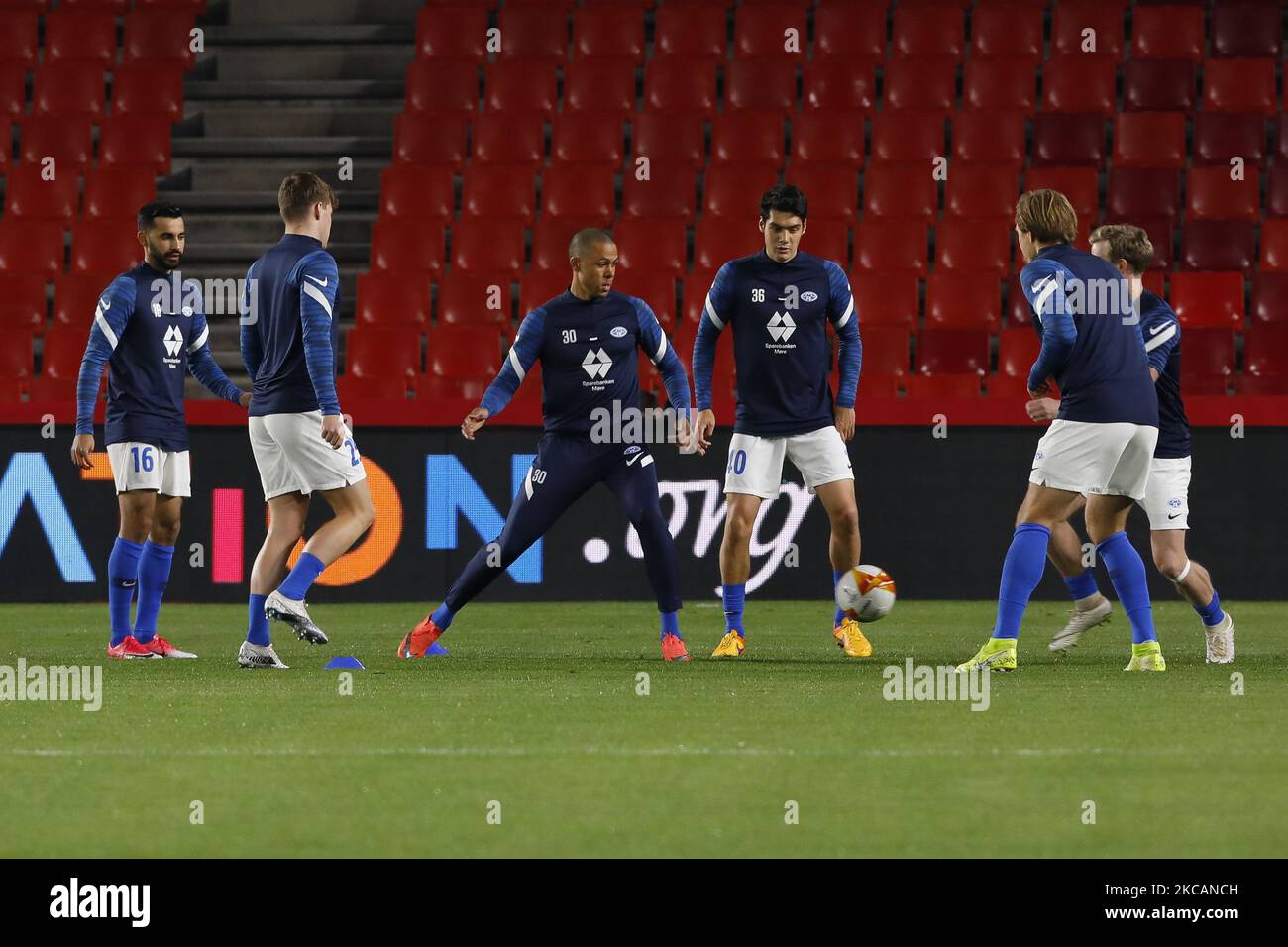 Mold FK team warming up during the UEFA Europa League Round of 16 Leg One match between Granada CF and Molde FK at Nuevo Los Carmenes Stadium on March 11, 2021 in Granada, Spain. Football stadiums in Spain remain closed to fans due to the Coronavirus Pandemic. (Photo by Álex Cámara/NurPhoto) Stock Photo