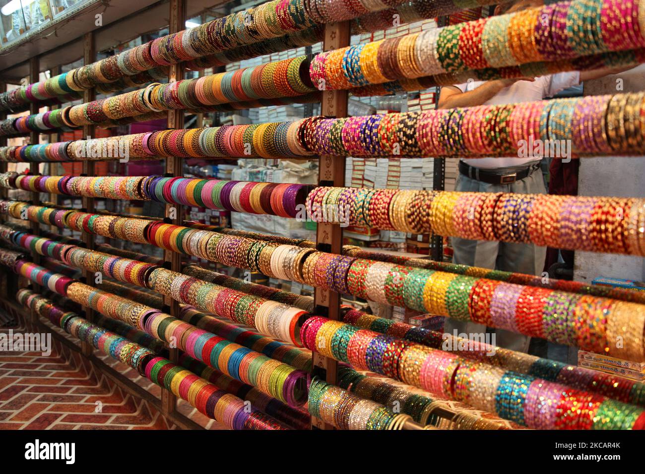 Colourful glass bangles displayed at a shop in the bangle market at