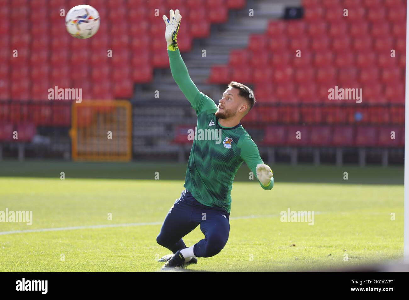 Alejandro Remiro, of Real Sociedad warms up during the La Liga match between Granada CF and Real Sociedad at Nuevo Los Carmenes Stadium on March 14, 2021 in Granada, Spain. Football stadiums in Spain remain closed to fans due to the Coronavirus Pandemic. (Photo by Álex Cámara/NurPhoto) Stock Photo