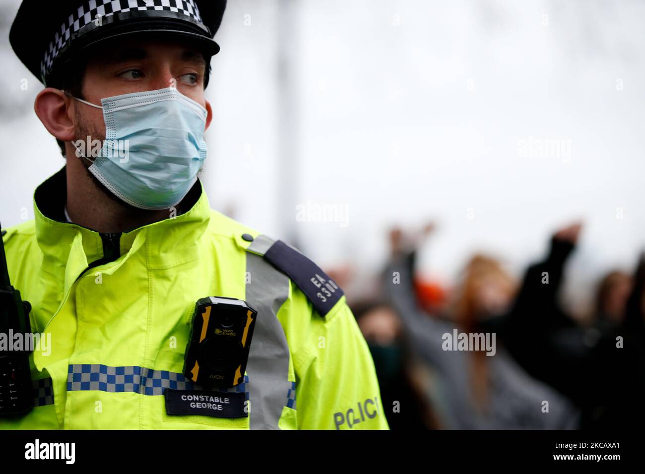 Police officer keeps watch hi res stock photography and images Alamy