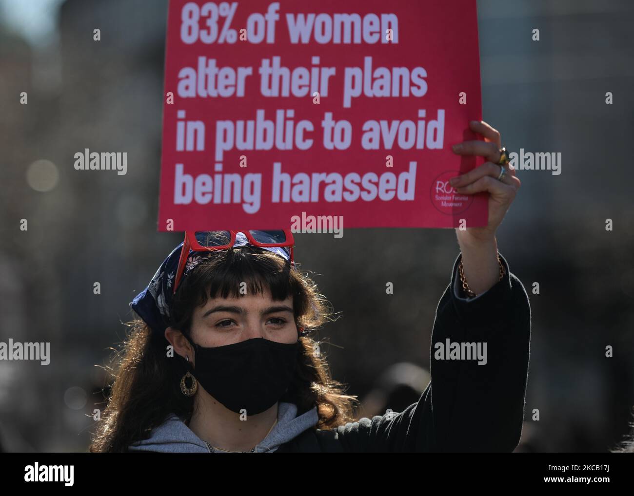 An activist holds a placard reading '83% of women alter their plans in public to avoid being harassed' during a solidarity protest with women in the UK against gender-based violence seen on O'Connell Street in Dublin. The tragic killing of 33-year-old Sarah Everard in London sparked outrage among women in Britain, Ireland and across the world. Activists demand further action to combat violence against women. On Tuesday, 16 March 2021, in Dublin, Ireland. (Photo by Artur Widak/NurPhoto) Stock Photo