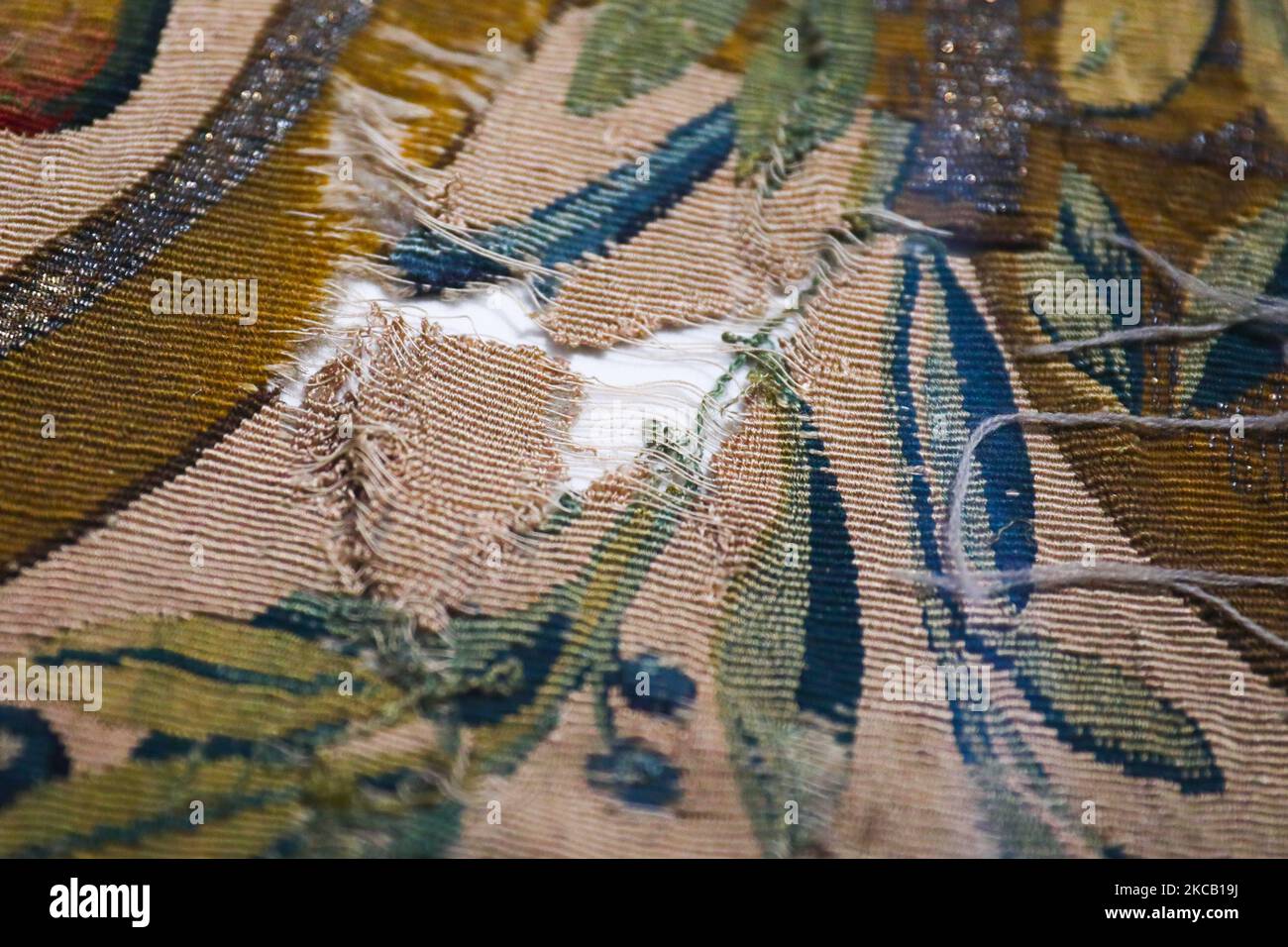 A partially damaged tapestry is shown during the major exhibition 'All the King’s Tapestries: Homecomings 2021-1961-1921' at the Wawel Royal Castle in Krakow, Poland on March 16, 2021. For the first time all 137 of the royal tapestries from the collection of King Sigismund II Augustus that are preserved in Poland are now open for viewers for six months.Tapestries from the leading Brussels’ workshops in the mid-1500s, range from monumental figurative textiles with biblical scenes, through verdures depicting animals and armorial tapestries, to small tapestries meant to cover furniture. (Photo by Stock Photo