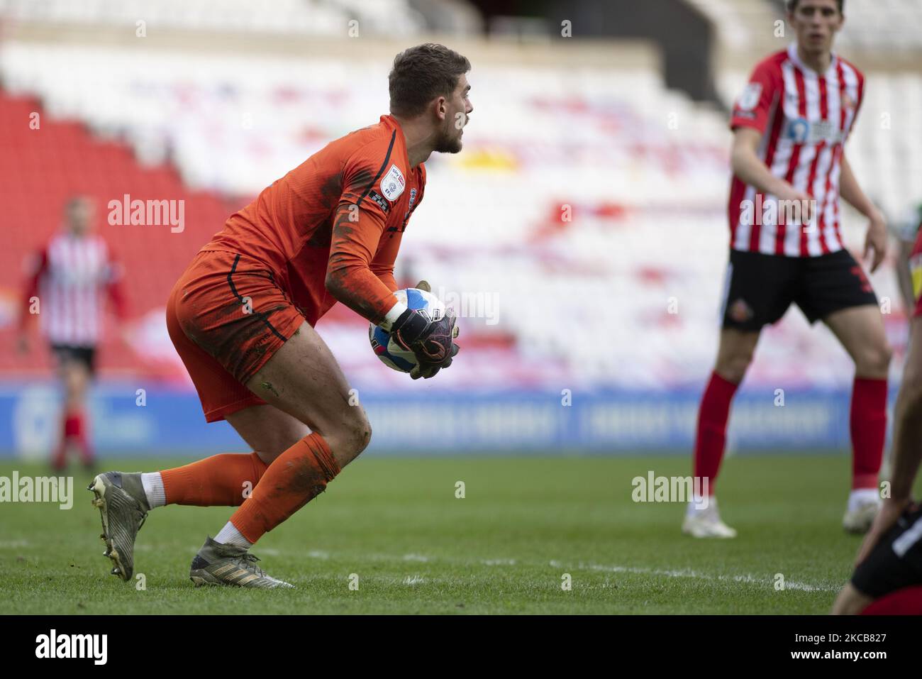 Lincoln City goalkeeper Alex Palmer easily takes the ball during the Sky Bet League 1 match between Sunderland and Lincoln City at the Stadium Of Light, Sunderland on Saturday 20th March 2021. (Photo by Trevor Wilkinson/MI News/NurPhoto) Stock Photo
