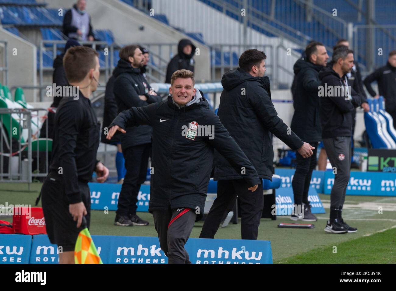 Marlon Ritter (second from left) of 1. FC Kaiserslautern reacts during the 3. Liga match between 1. FC Magdeburg and 1. FC Kaiserslautern at MDCC-Arena on March 20, 2021 in Magdeburg, Germany. (Photo by Peter Niedung/NurPhoto) Stock Photo