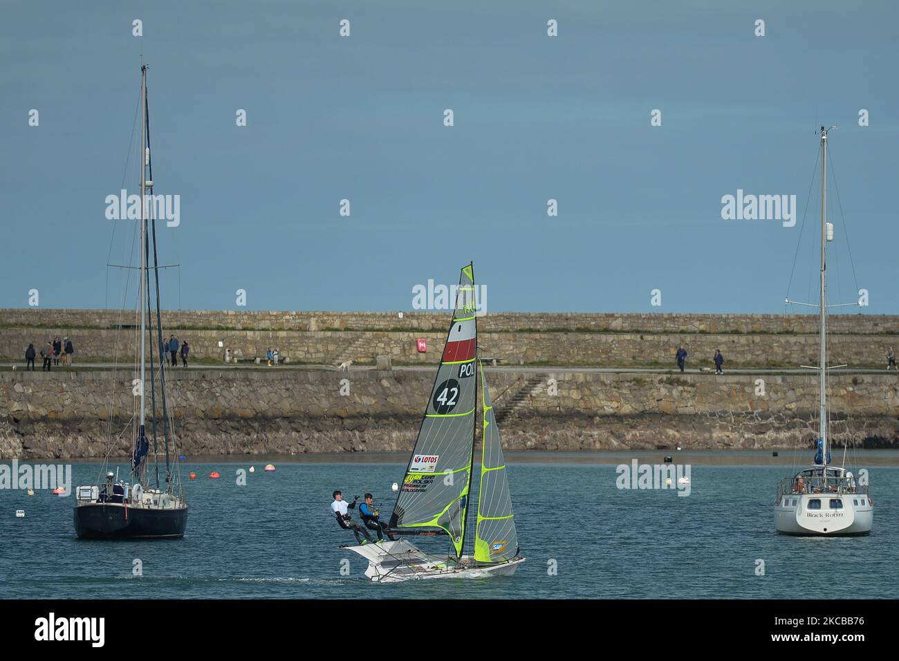 Members of the 49er Team Poland sailing in Dun Laoghaire harbour prepare for training near the West Pier, during Level 5 Covid-19 lockdown. On Sunday, 21 March, 2021, in Dún Laoghaire, Dublin, Ireland. (Photo by Artur Widak/NurPhoto) Stock Photo