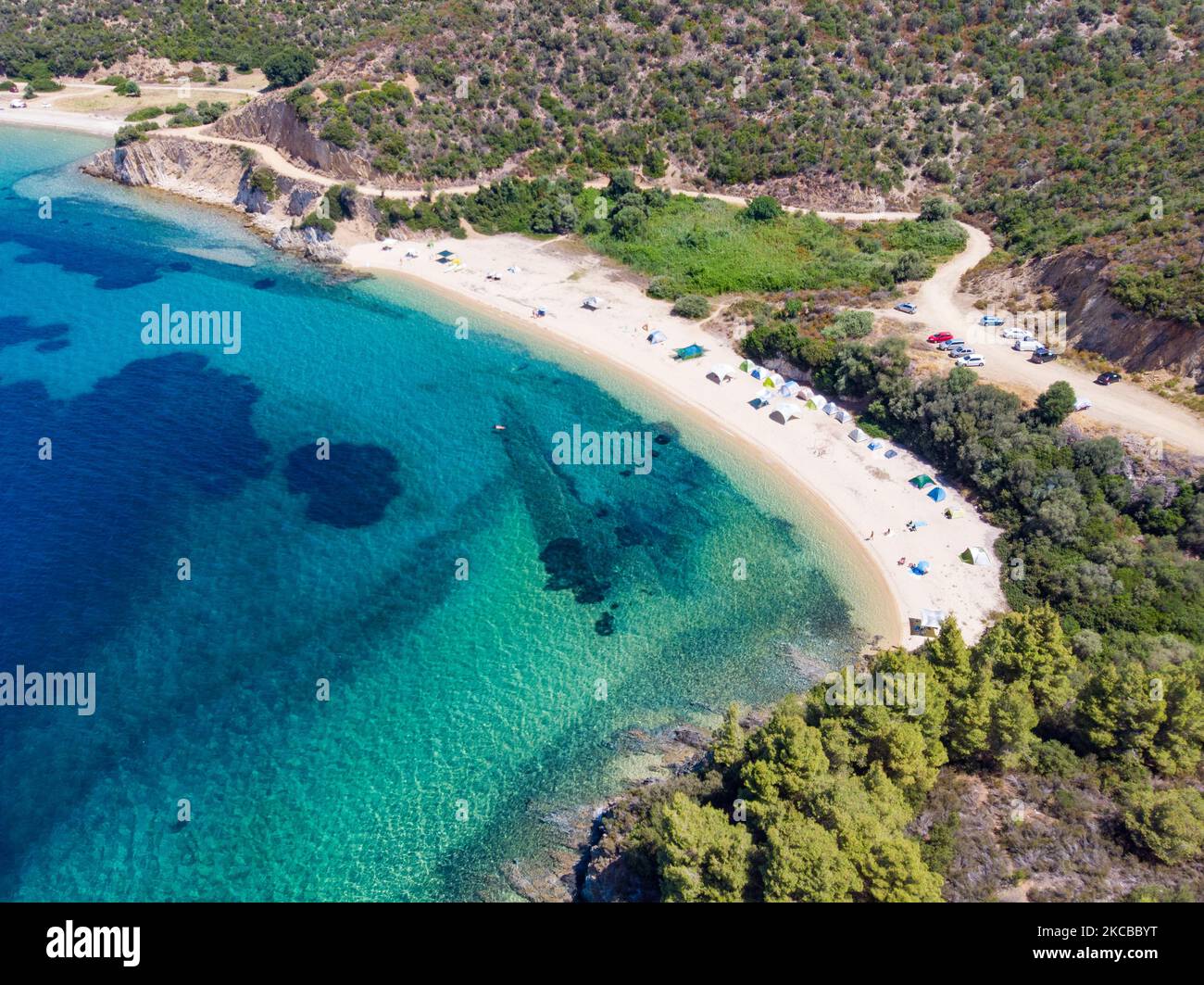 Aerial bird's eye panoramic view from a drone of Aretes beach, in ...