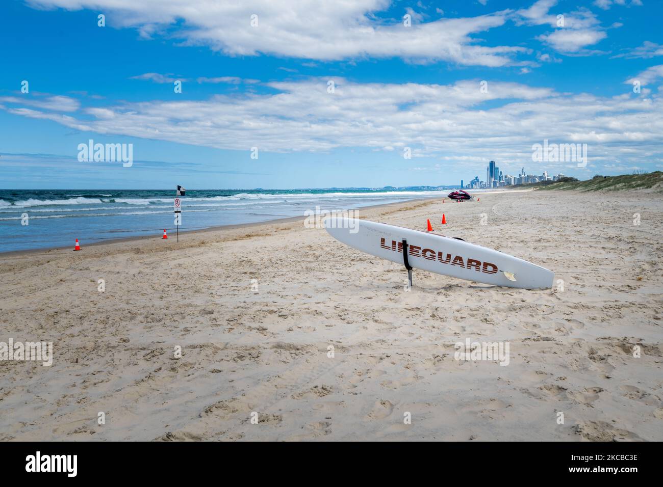 Lifeguard surf board and jet ski on the beach at The Spit Gold Coast Stock Photo