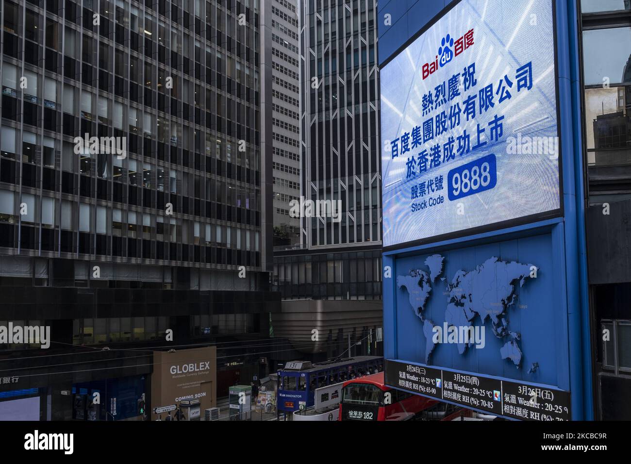 A screen shows a message marking the listing of Baidu Inc. on the Hong
