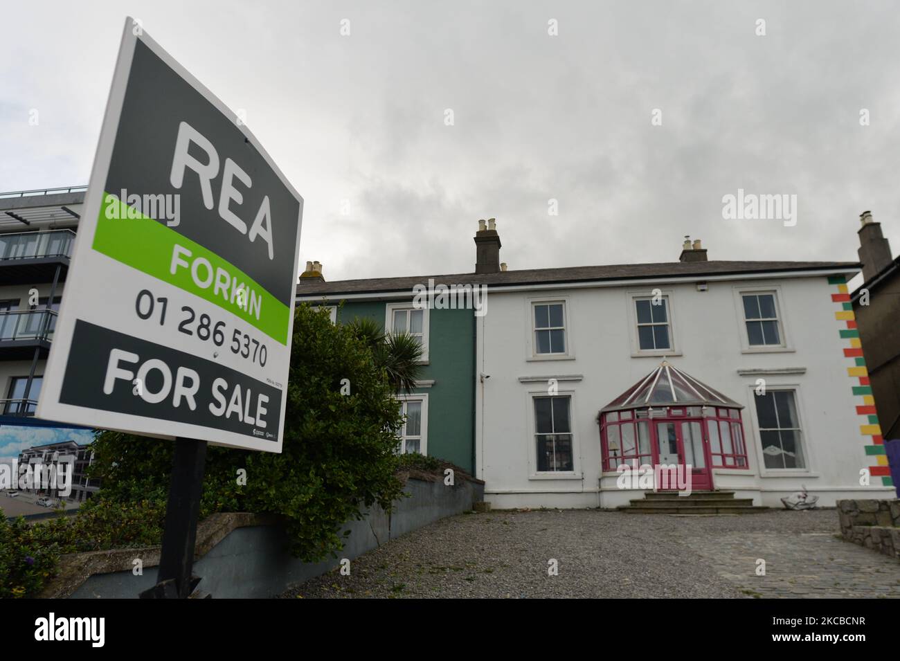 View of sinead oconnors colourful seafront home hires stock