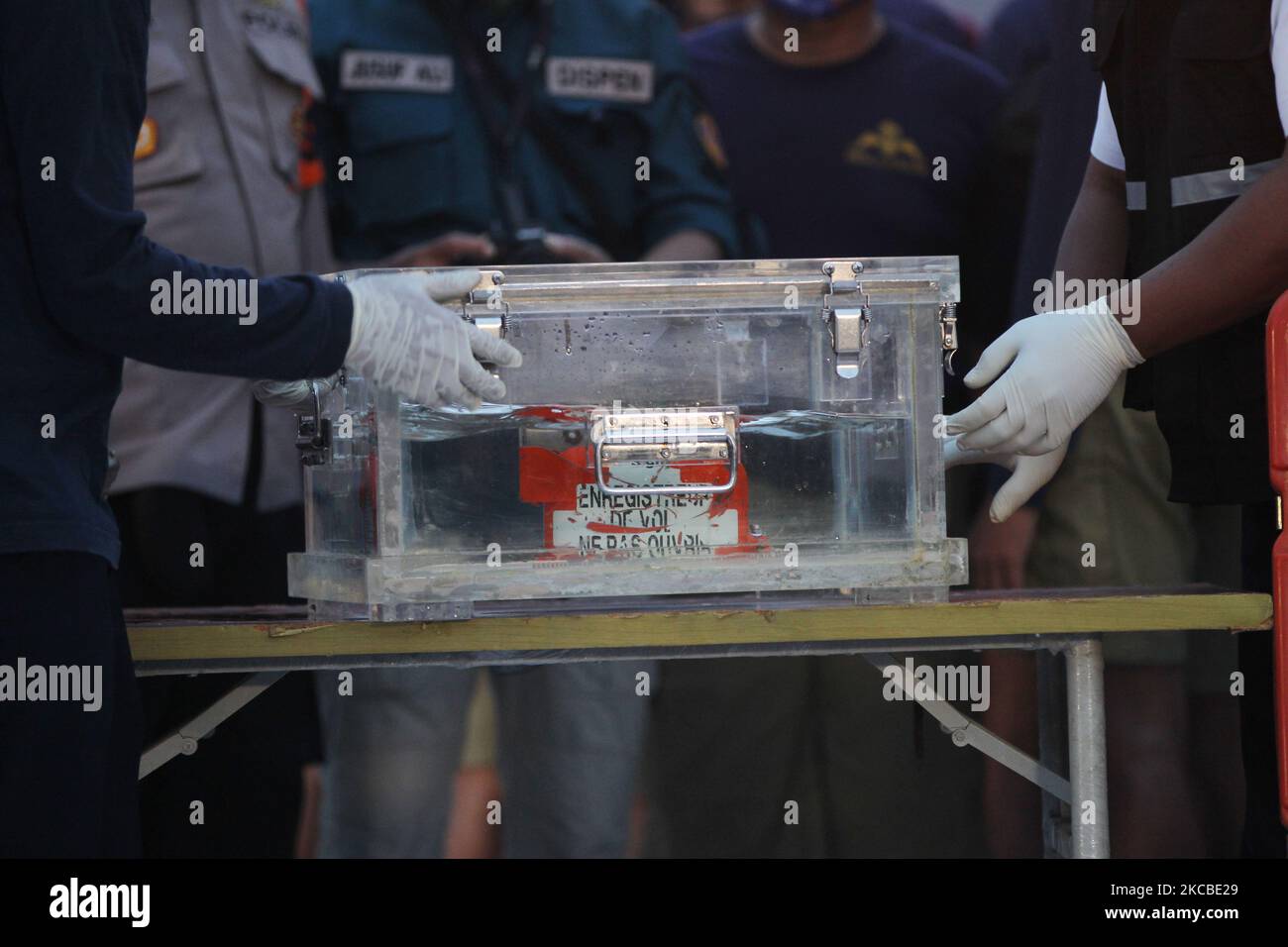 The Sriwijaya Air airline blackbox was found and entered into a special place to be taken for investigation at JICT pier, Tanjung Priok port, Jakarta on January 12, 2021. The search for the black box or black box of the Sriwijaya Air SJ182 aircraft that crashed in the waters around the island of Laki-Pulau Lancang, Jakarta after four days of searching. The blackbox was found by the Indonesian National Army (TNI) Navy. (Photo by Dasril Roszandi/NurPhoto) Stock Photo