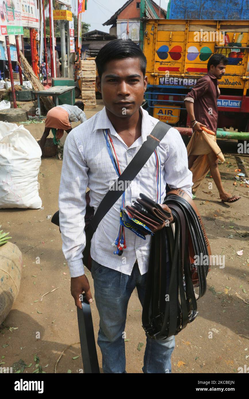 Man selling belts and wallets at the Chalai market in the city of Thiruvananthapuram (Trivandrum), Kerala, India. (Photo by Creative Touch Imaging Ltd./NurPhoto) Stock Photo