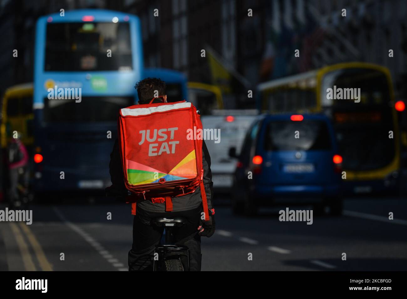 A Just Eat currier seen in Dublin city center during Level 5 Covid-19 lockdown. On Thursday, March 25, 2021, in Dublin, Ireland. (Photo by Artur Widak/NurPhoto) Stock Photo