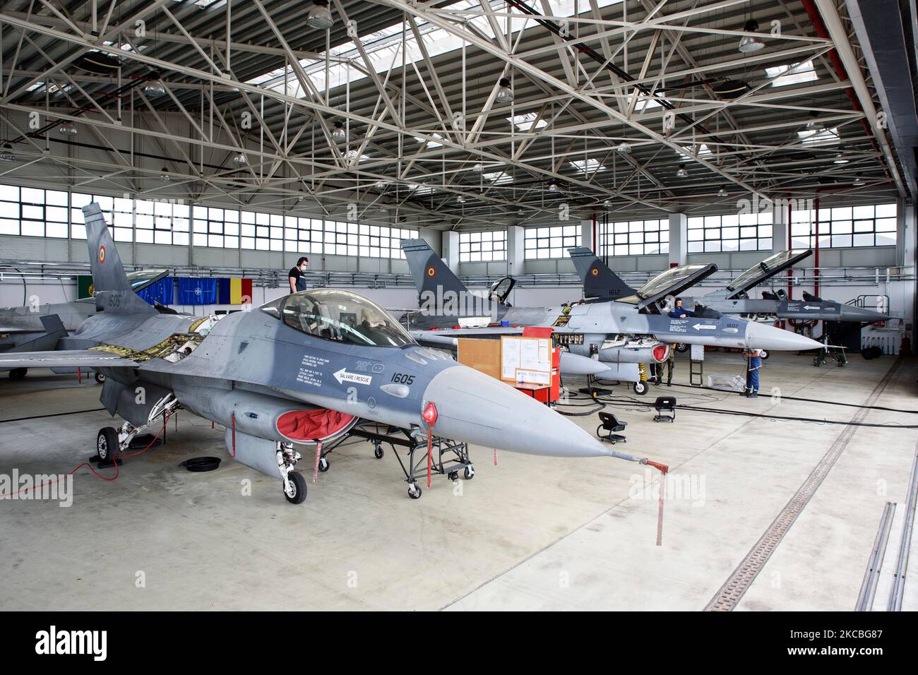 Romanian Air Force F-16's inside the maintenance hangar at an airbase in Romania. Stock Photo