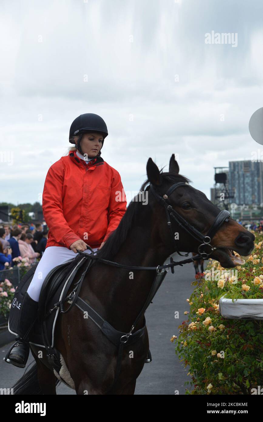 Jockeys and people take part during 3rd day of Melbourne Cup Carnival