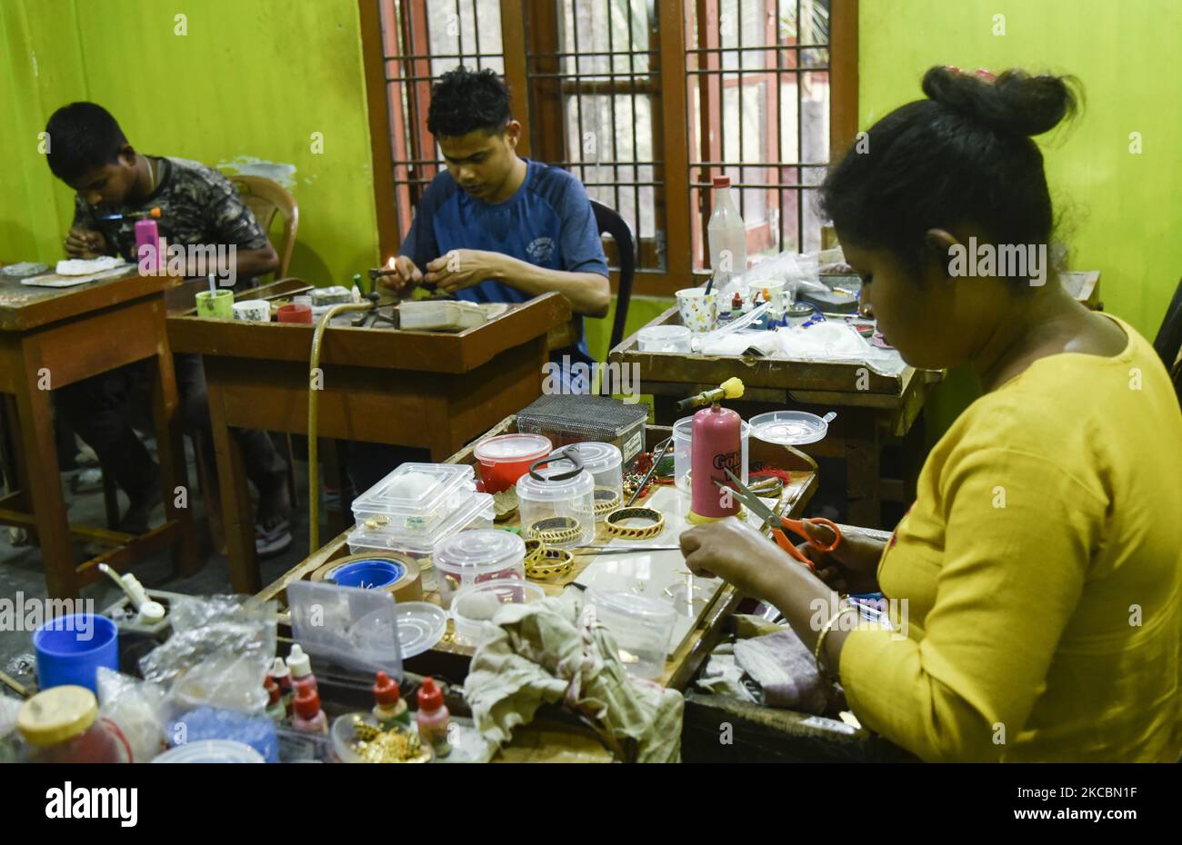 Jewellers manufacturing Assamese Traditional Jewellery at a workshop ...