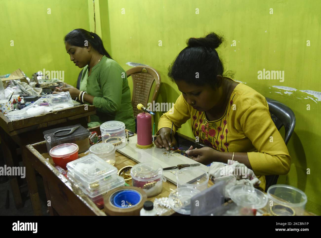 Jeweller manufacturing Assamese Traditional Jewellery at a workshop ...