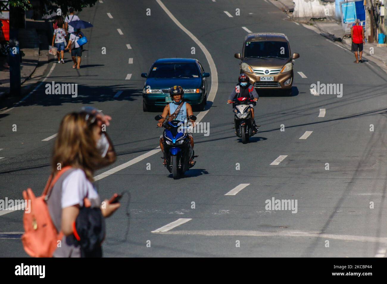 Few vehicles and residents are seen in downtown of Antipolo City, Rizal on first day of ECQ in Greater Manila Area, Philippines on March 29, 2021. The Government reimposed the Enhanced Community Quarantine in NCR Bubble including the province of Rizal, Cavite, Laguna and Bulacan from March 29 to April 4, 2021 due to massive daily counts of COVID-19 in Philippines. As of March 28, the country reported 9,475 new cases with 721,891 total of COVID-19 cases and total death of 13,170. (Photo by Ryan Eduard Benaid/NurPhoto) Stock Photo