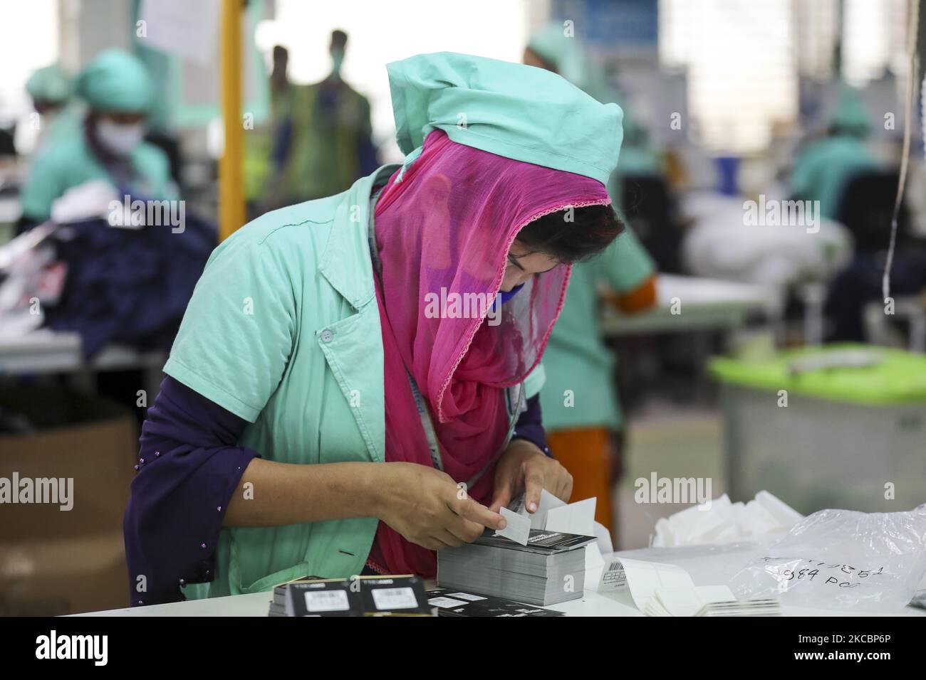 Ready made garments worker works in a garments factory in Gazipur, Bangladesh on March 29, 2021. (Photo by Kazi Salahuddin Razu/NurPhoto) Stock Photo