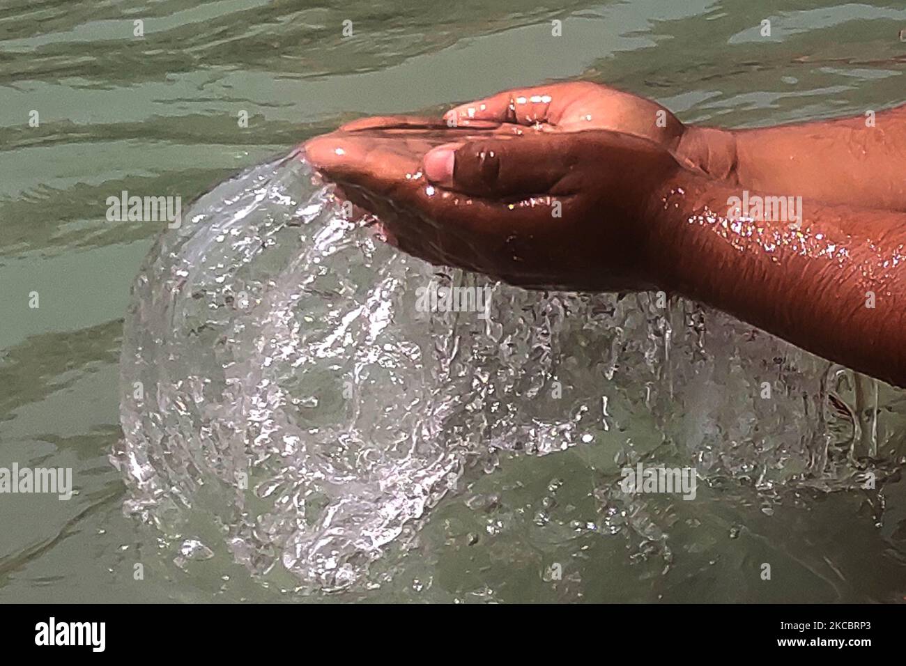 Hindu devotees perform a religious ritual for the departed souls of ...