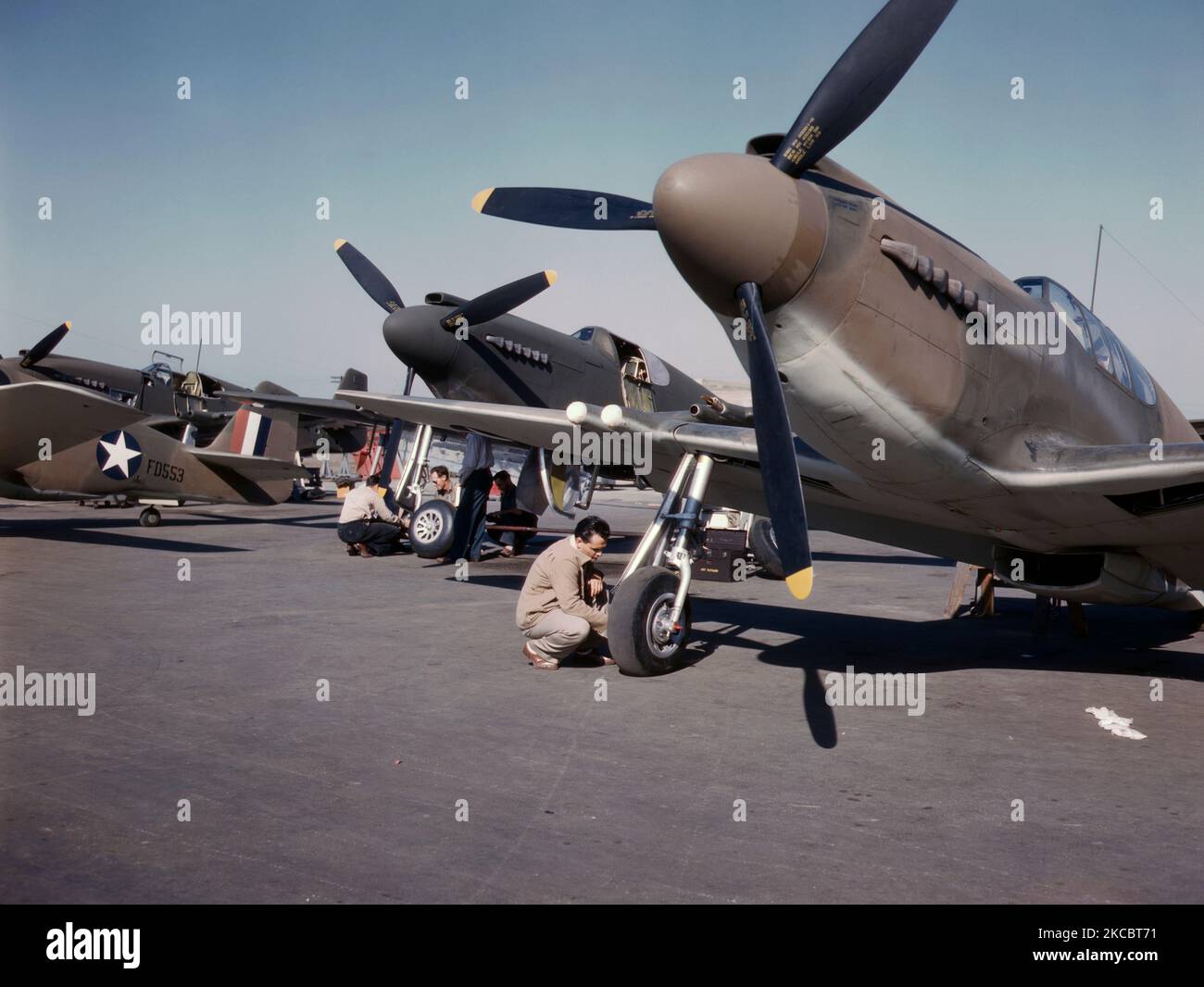 P-51 Mustang fighter planes being prepared for test flight during World War II, 1942. Stock Photo