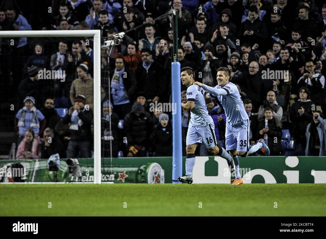 Man City forward Sergio Aguero is congratulated by Man City forward Stevan Jovetic after equalising during the UEFA Champions League, Group E match between Manchester City & Bayern Munich at the Etihad Stadium in Manchester on Wednesday November 25th 2014. (Photo by MI News/NurPhoto) Stock Photo