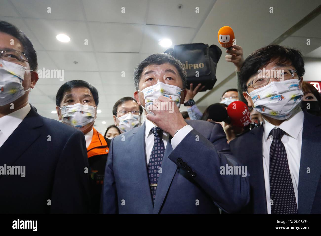 Taiwan's Health Minister Chen Shih-chung (C) arrives to inspect Covid-19 coronavirus testing at Taoyuan International Airport near Taipei on April 1, 2021, as Taiwanese tourists headed to Palau under the first travel bubble in Indo-Pacific Asia. (Photo by Ceng Shou Yi/NurPhoto) Stock Photo