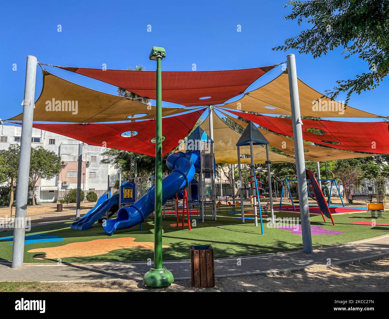 View of children's complex on playground Stock Photo - Alamy