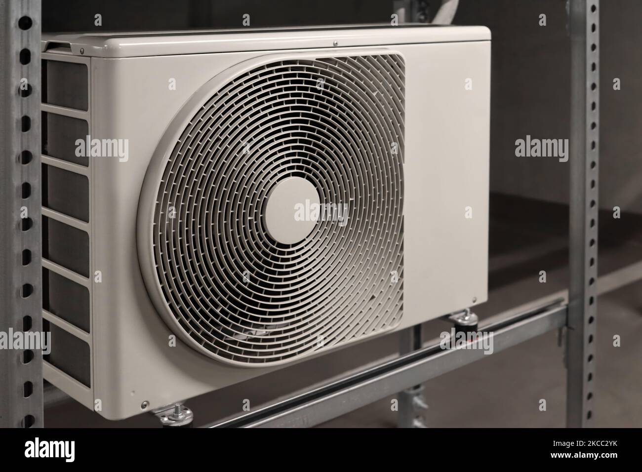 Shelving unit with air conditioner in underground parking lot Stock