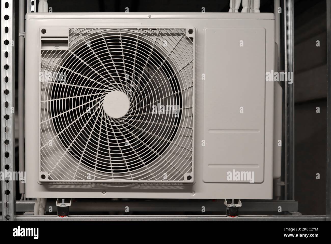 Shelving unit with air conditioner in underground parking lot Stock